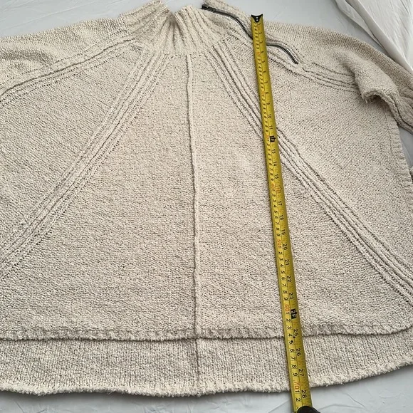 Free People Spin Around Poncho Top in an off-white cream color - Picture 7 of 10